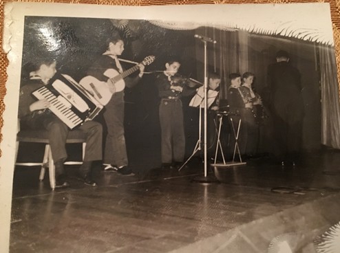 Zack leading a cub scout band at the Waldorf Hotel